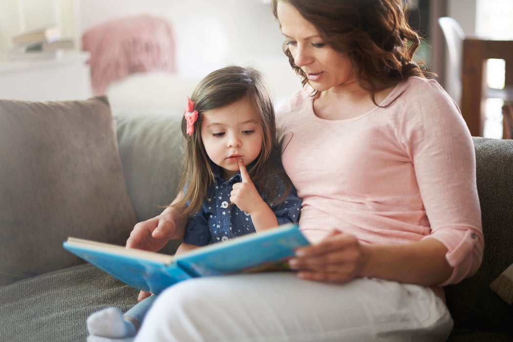 Mother and child reading a book