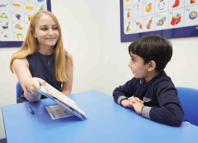 I Can Read teacher showing child reading material