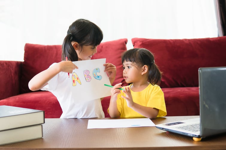 two-asian-child-girl-students-study-online-with-te-2023-11-27-05-00-58-utc (1)