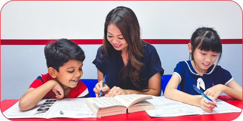 Teacher in an I Can Read class with 2 students Teacher in an I Can Read class with 2 students